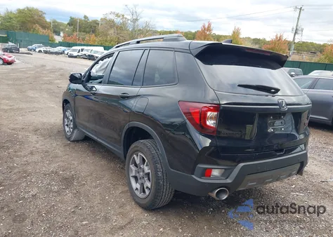 2023 Honda Passport Awd Trailsport from USA, damaged, VIN 5FNYF8H62PB040701